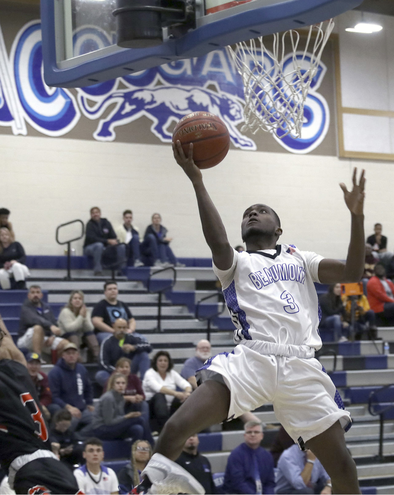 Cougar Kamari Ross is all air, as he puts two in from the sky.